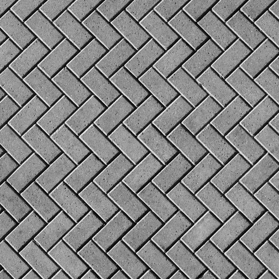 Concrete pavers in a herringbone pattern (representative image)